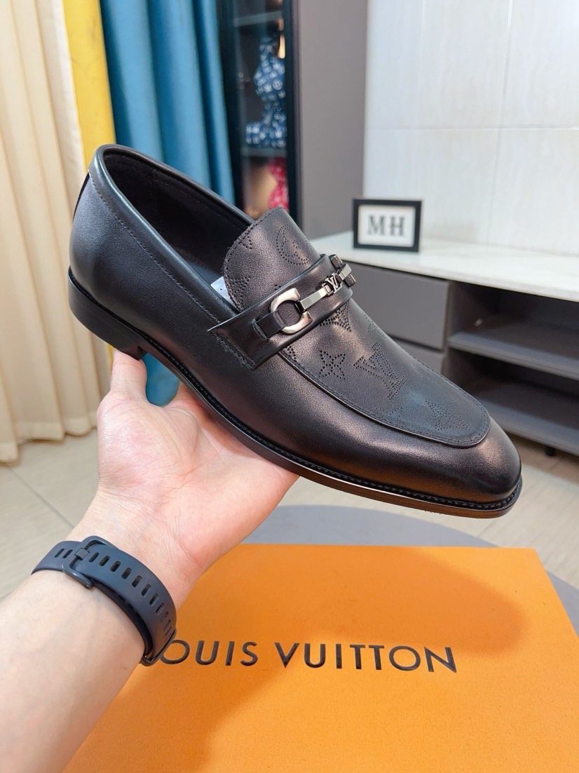 Louis Vuitton Black Metal-Bit Loafers — model