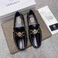 Versace Black Gold Hardware Loafers — hero
