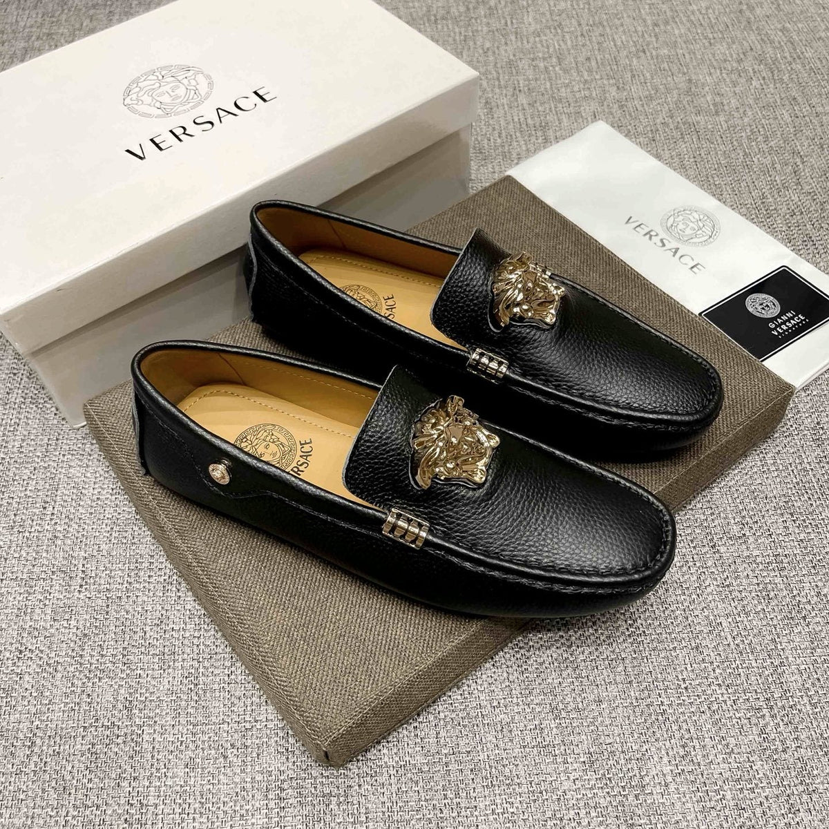 Versace Textured Leather Medusa Loafers — hero