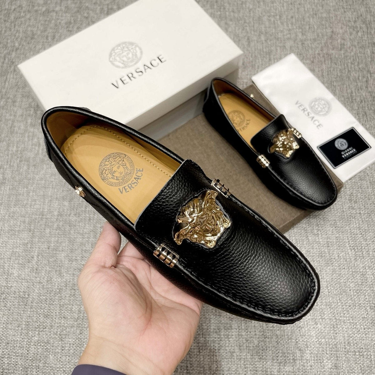 Versace Textured Leather Medusa Loafers — model