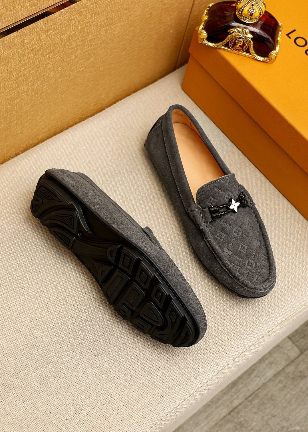Louis Vuitton Embossed Metal-Detail Loafers — front