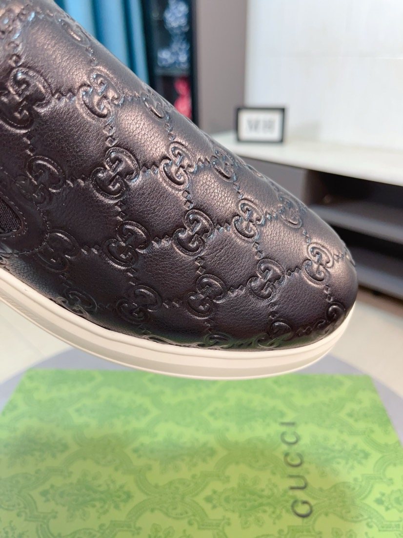Gucci Embossed Slip-On Sneakers — detail