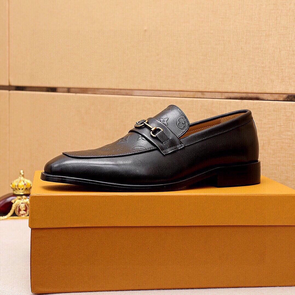 Louis Vuitton Embossed Buckle Loafers — side