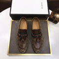 Gucci Monogram Tassel Loafers — front