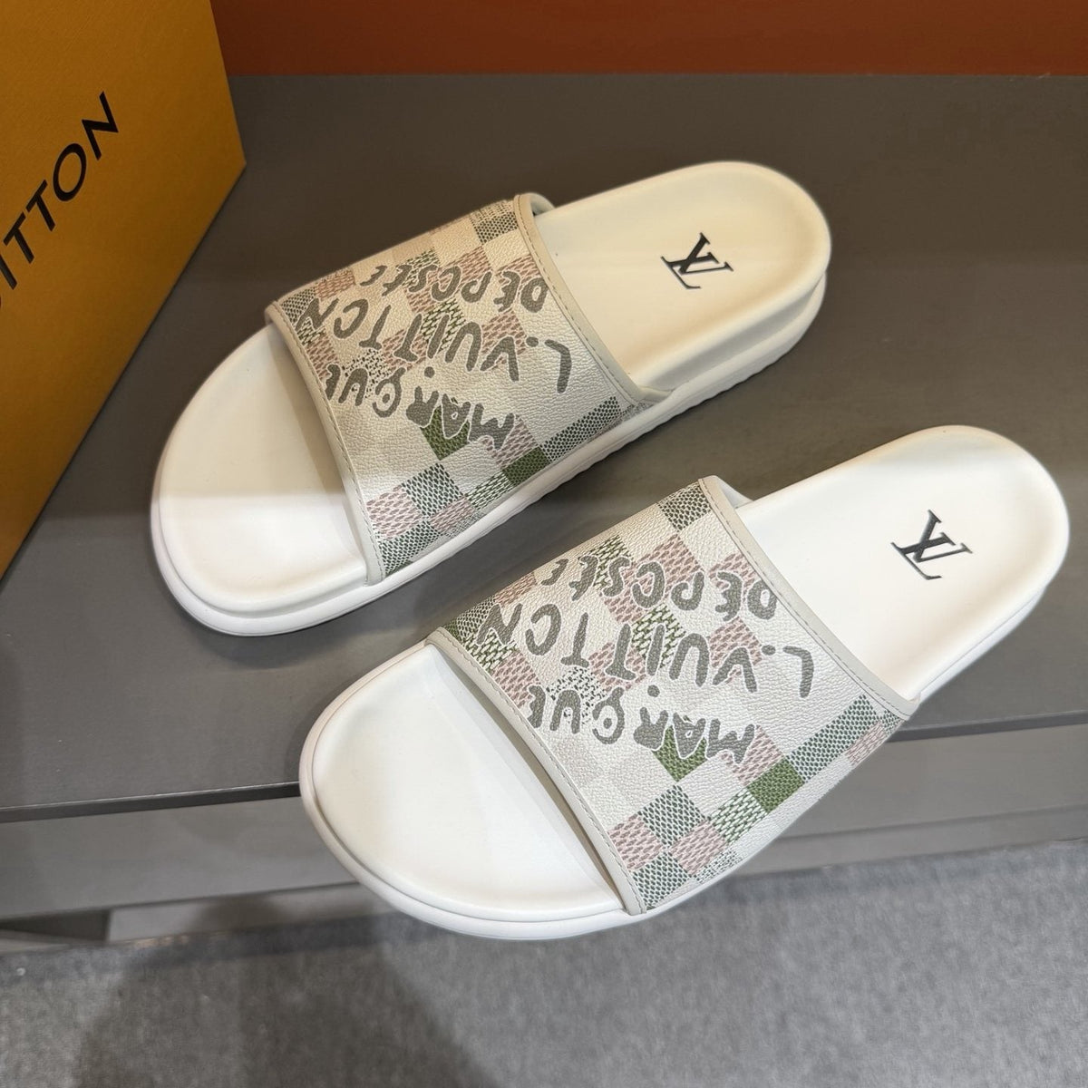 Louis Vuitton Patterned Strap Slides — front