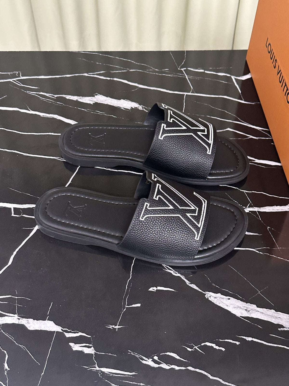 Louis Vuitton Logo Strap Slide Sandals — front