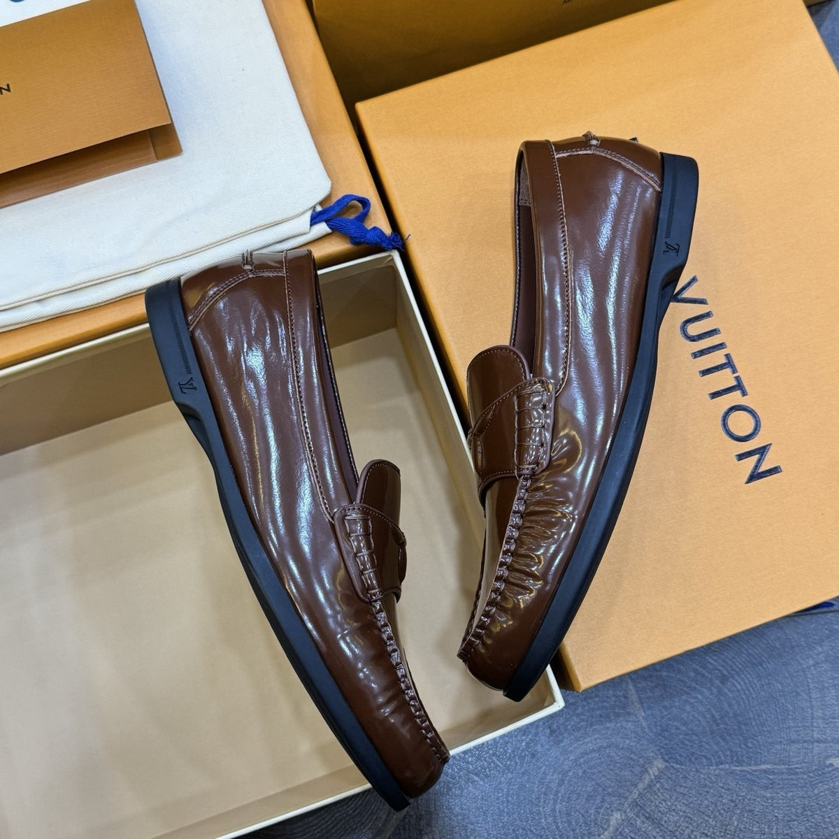 Louis Vuitton Brown Penny Loafers — front