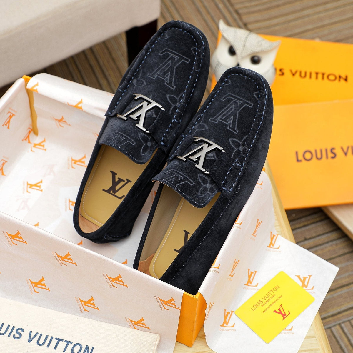 Louis Vuitton Embossed Driving Loafers — front