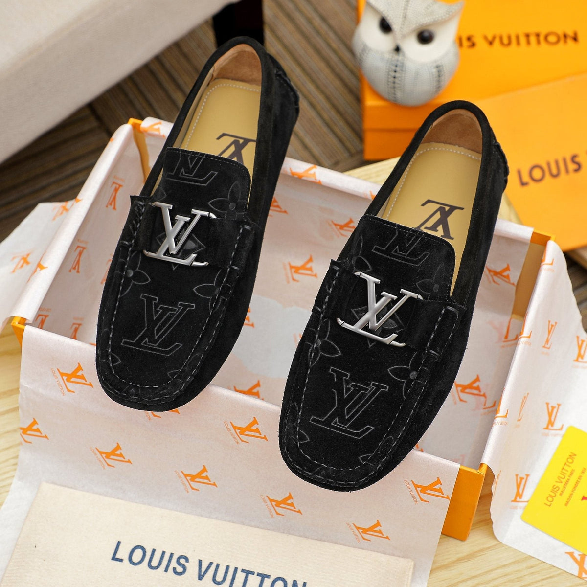 Louis Vuitton Embossed Driving Loafers — front