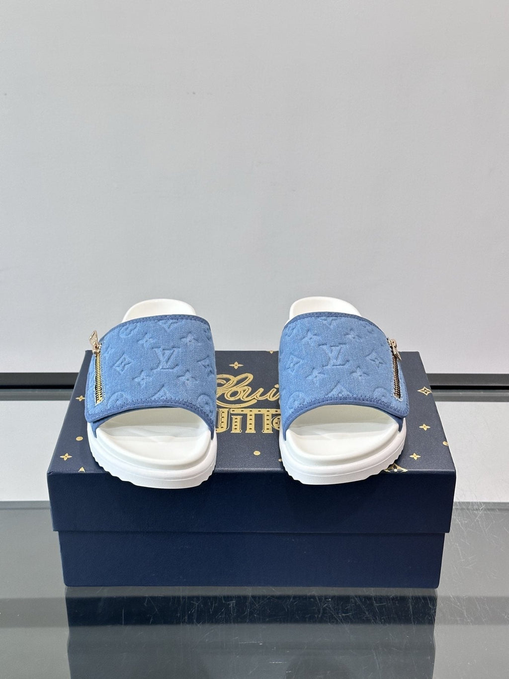 Louis Vuitton Embossed Monogram Slide Sandals — front