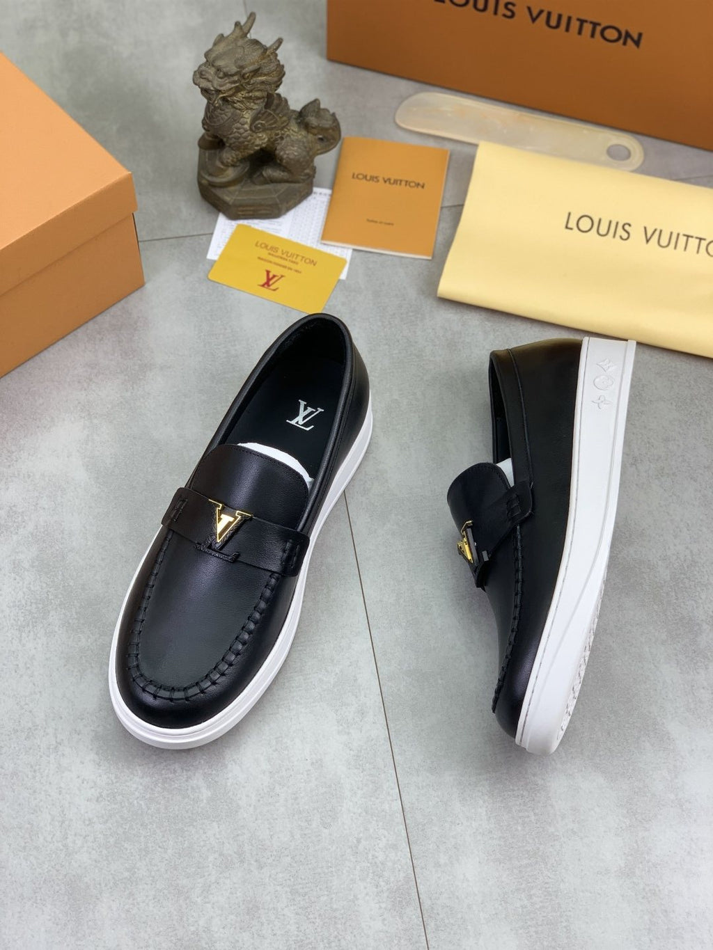 Louis Vuitton Metal Emblem Slip-On Loafers — side