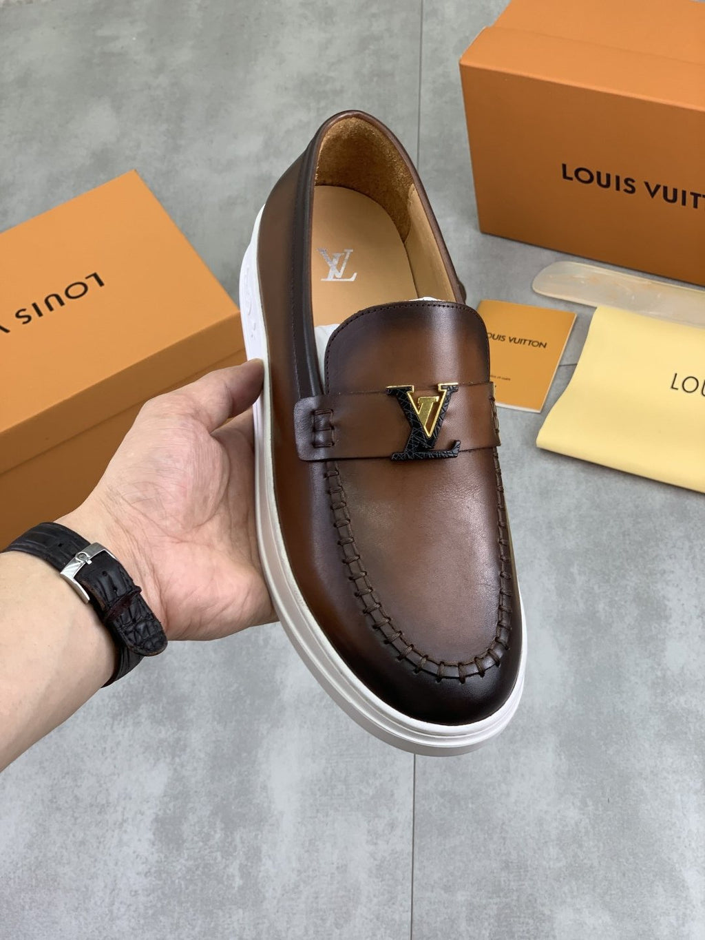 Louis Vuitton Metal Emblem Slip-On Loafers — front
