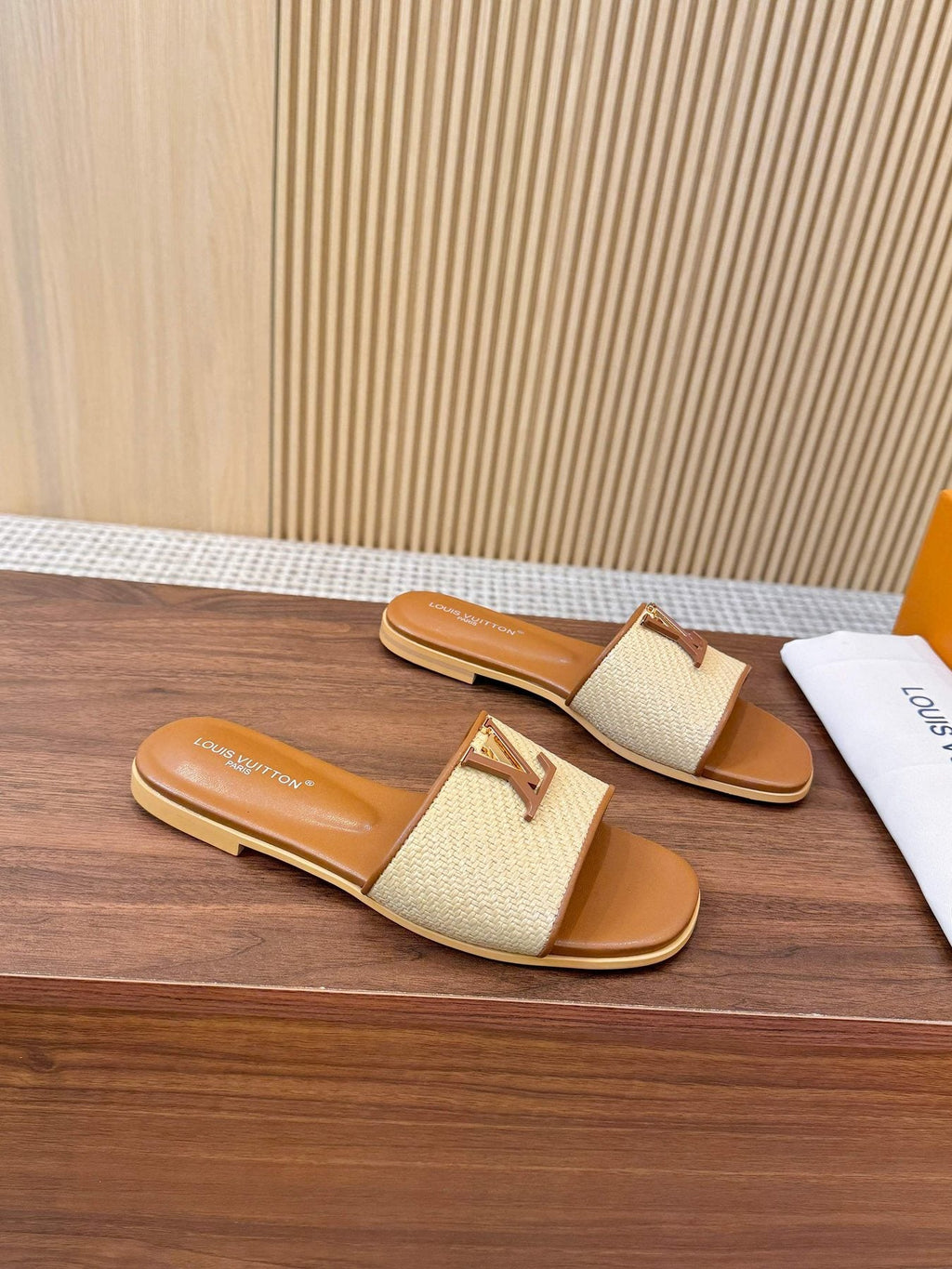 Louis Vuitton Textured Logo Slide Sandals — side