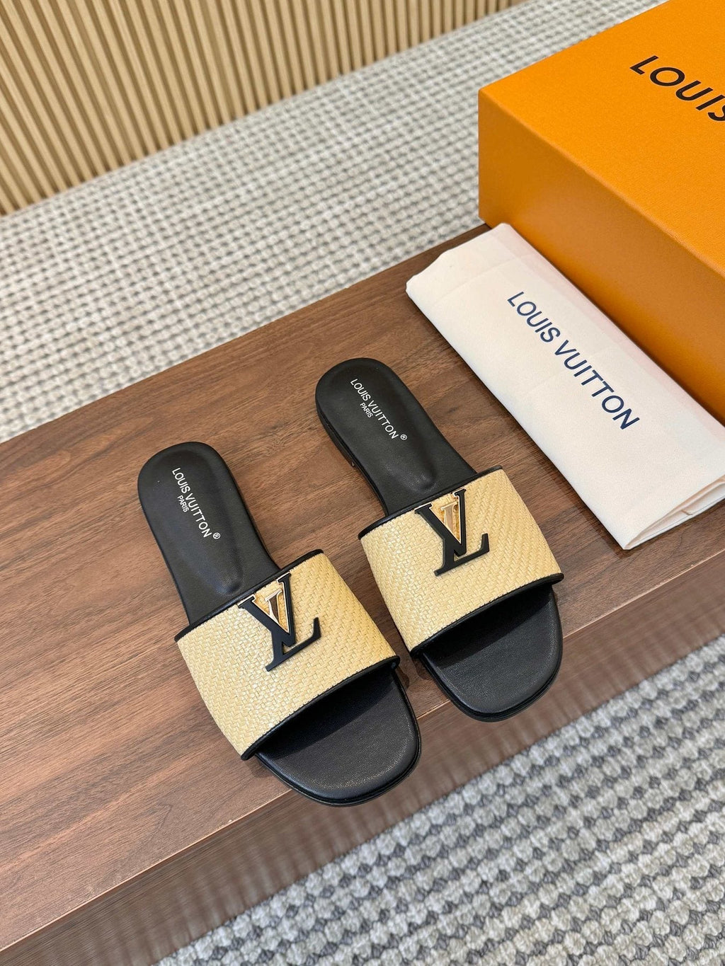 Louis Vuitton Textured Logo Slide Sandals — front