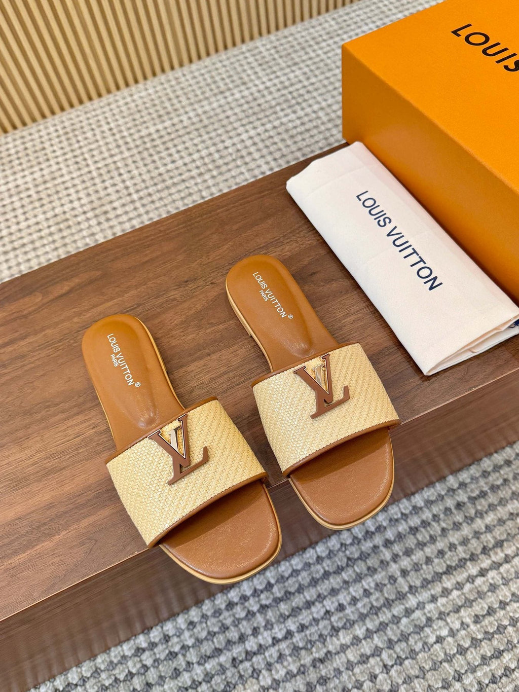 Louis Vuitton Textured Logo Slide Sandals — front