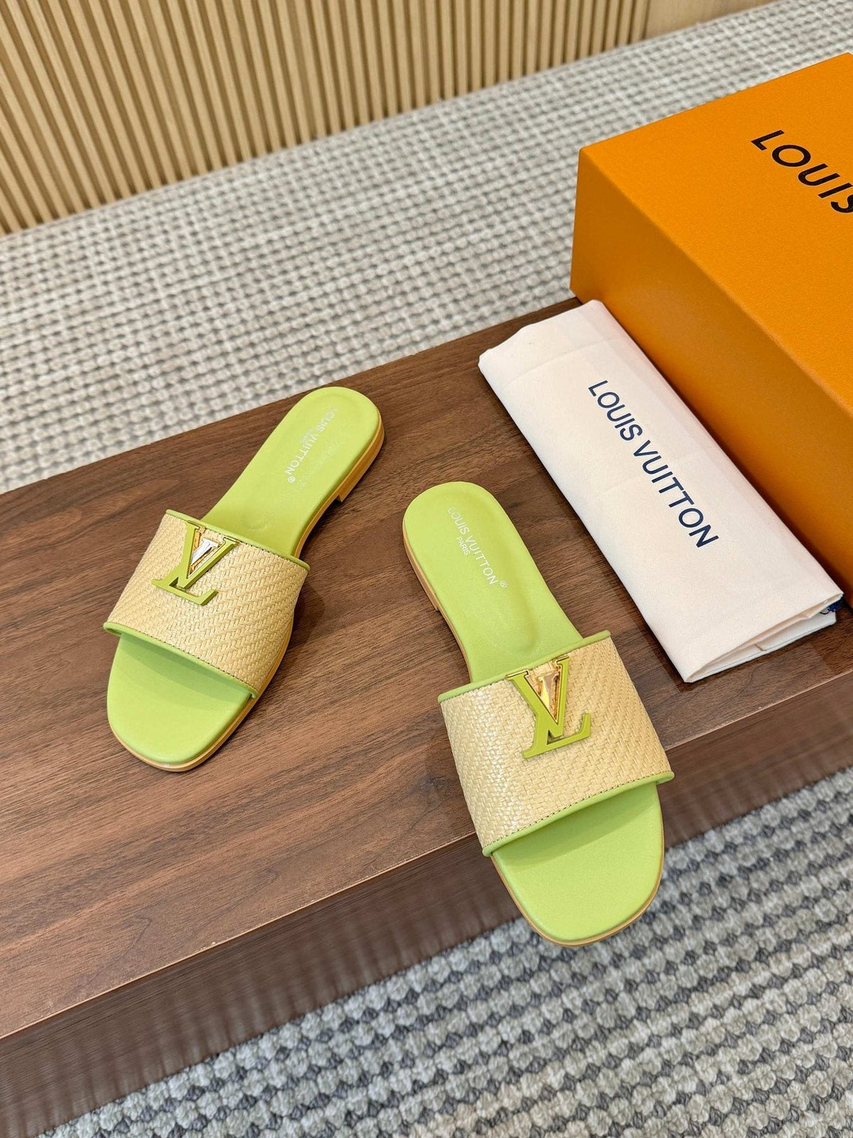 Louis Vuitton Textured Logo Slide Sandals — front