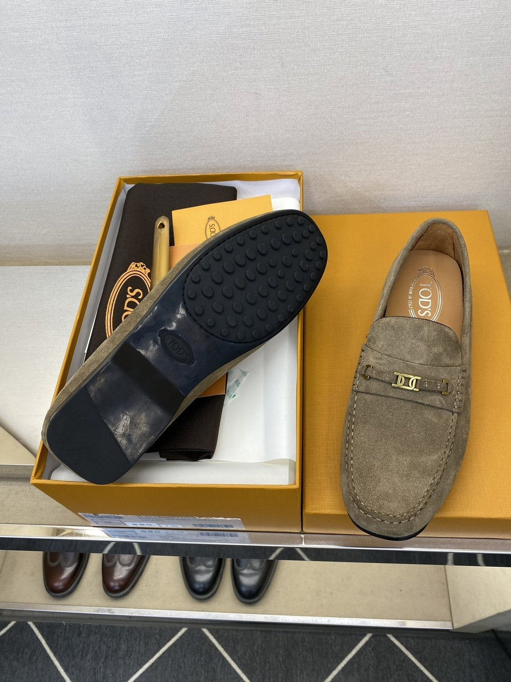 Tod's Gold-Tone Hardware Loafers — side