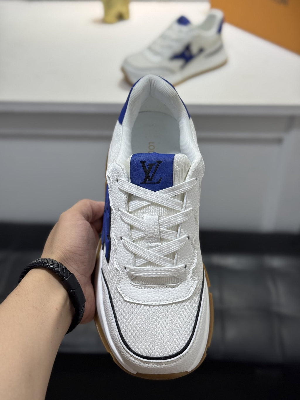 Louis Vuitton Low-Top Logo Sneakers — front