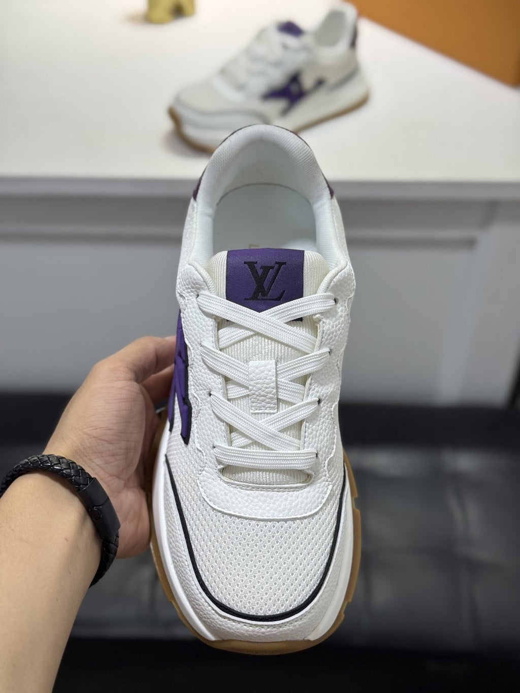 Louis Vuitton Low-Top Logo Sneakers — front