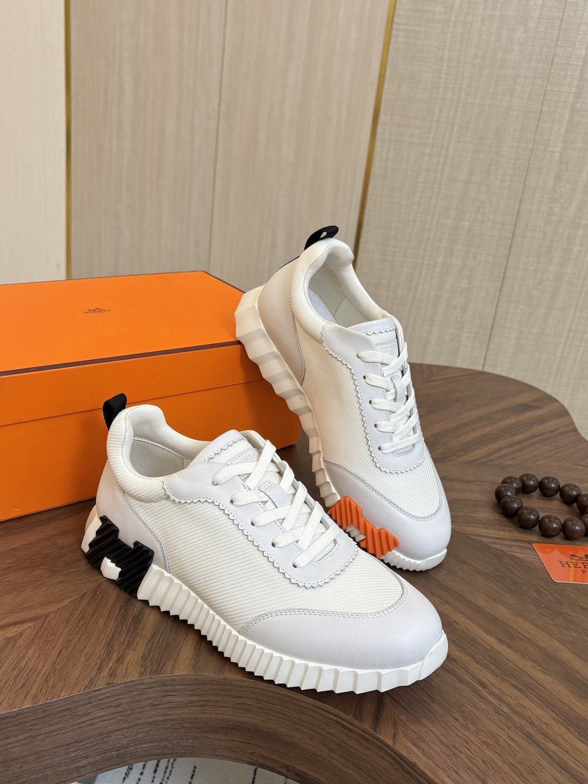 Hermes Black Ribbed Sole Sneakers — side