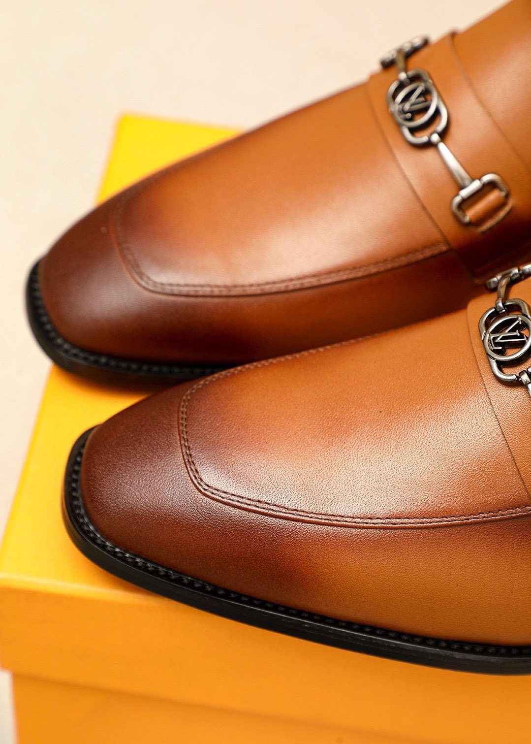 Louis Vuitton Metal-Bit Leather Loafers — detail
