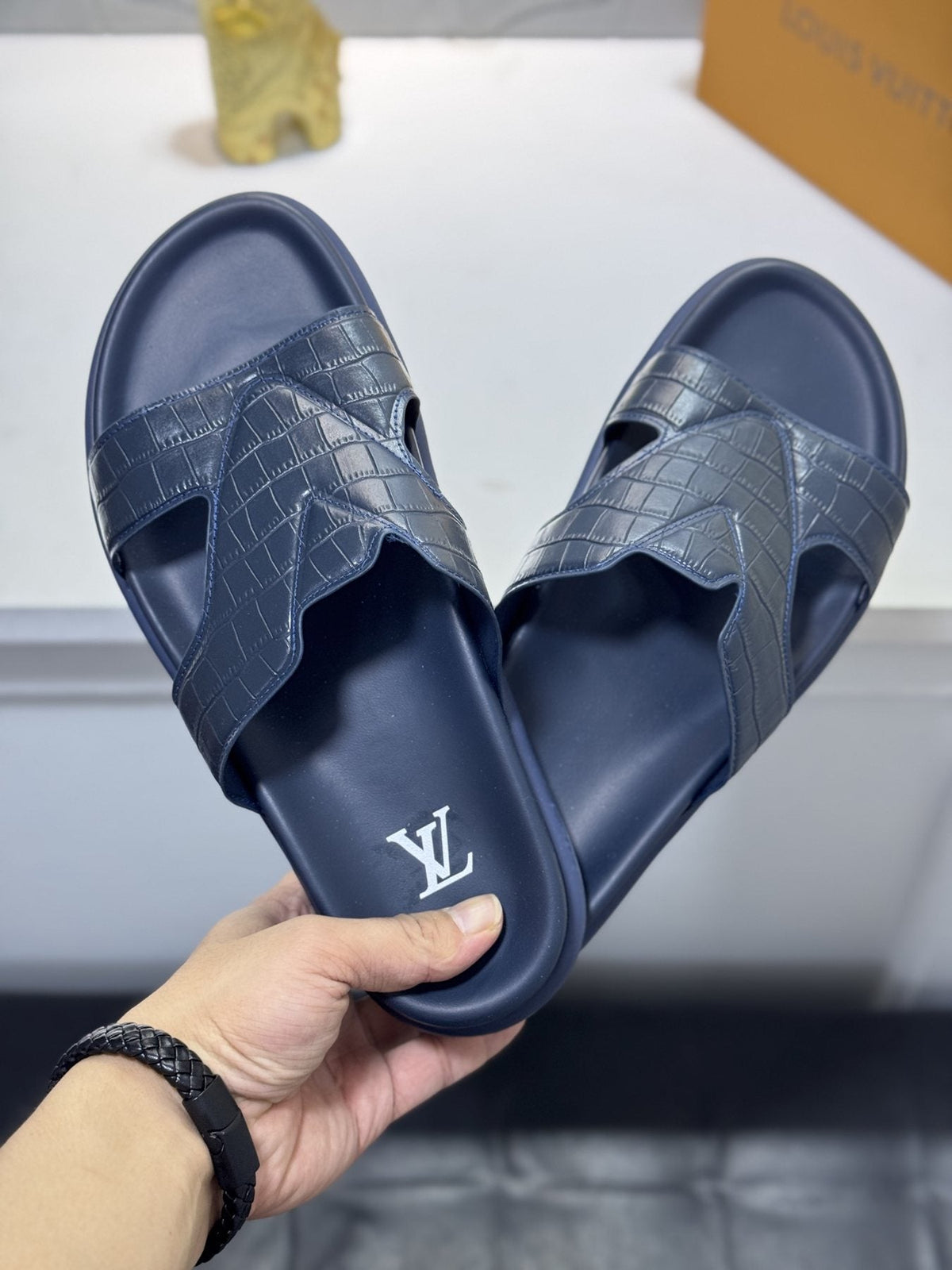 Louis Vuitton Embossed Strap Slide Sandals — model