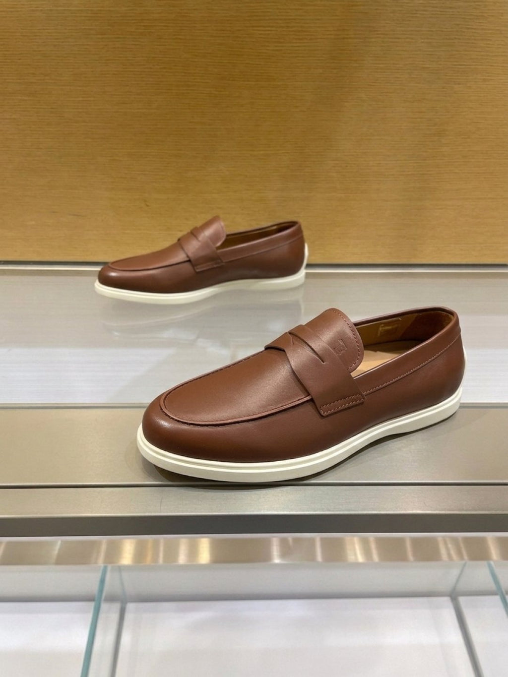 Tod's Brown Penny Loafers — side
