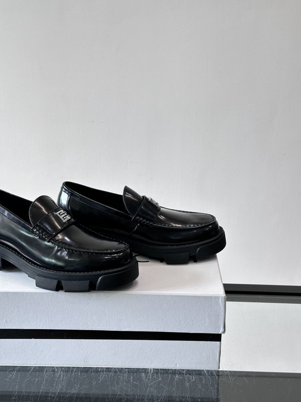 Givenchy Metal-Accent Lug Sole Loafers — side