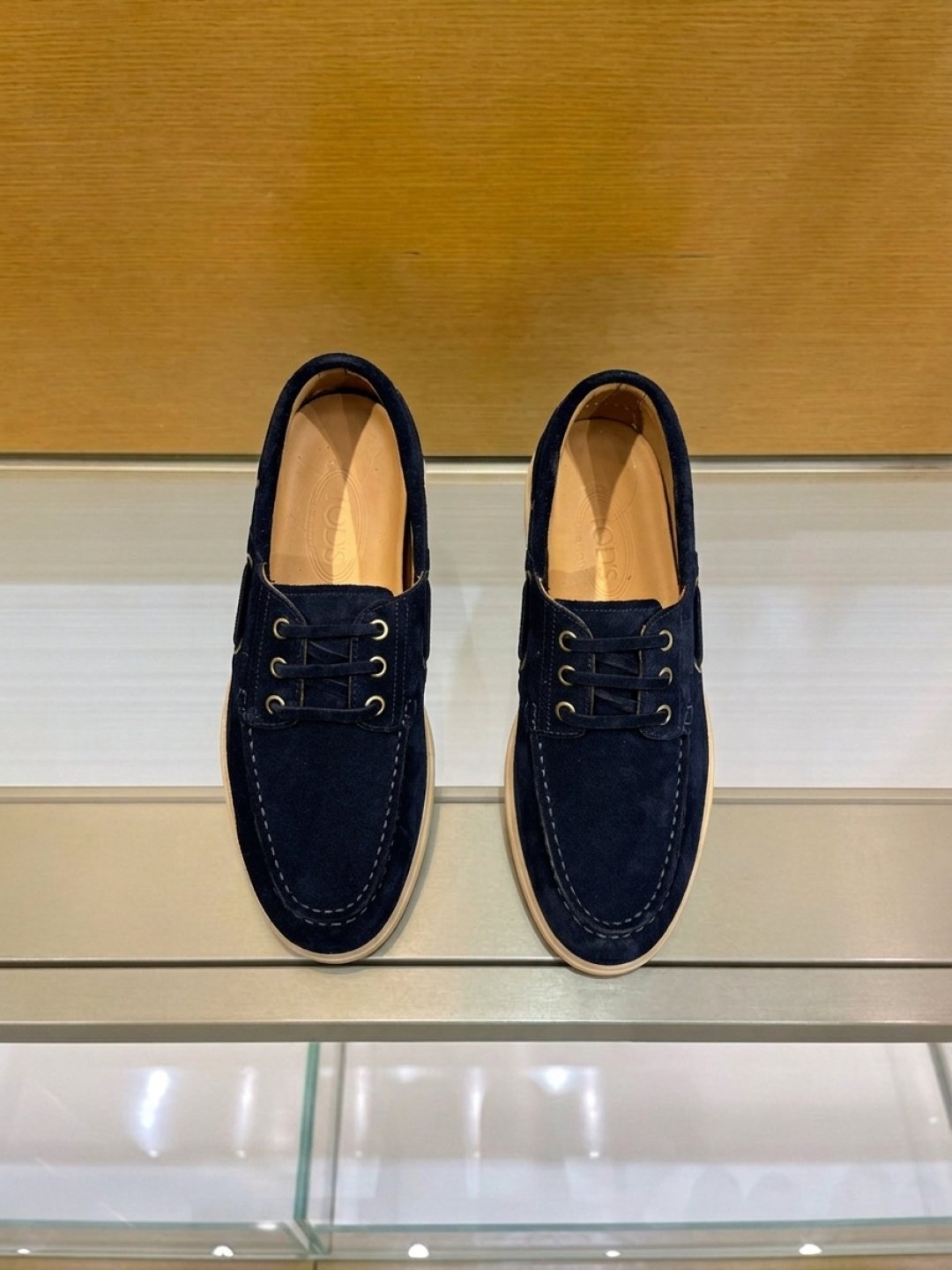 Tod's Navy Blue Boat Shoes — front