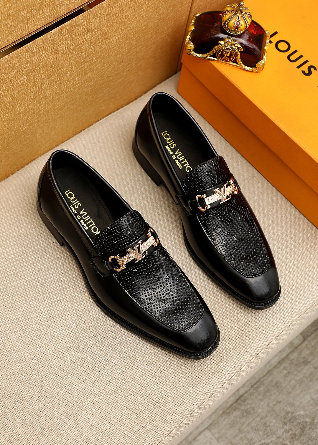 Louis Vuitton Embossed Buckle Loafers — front
