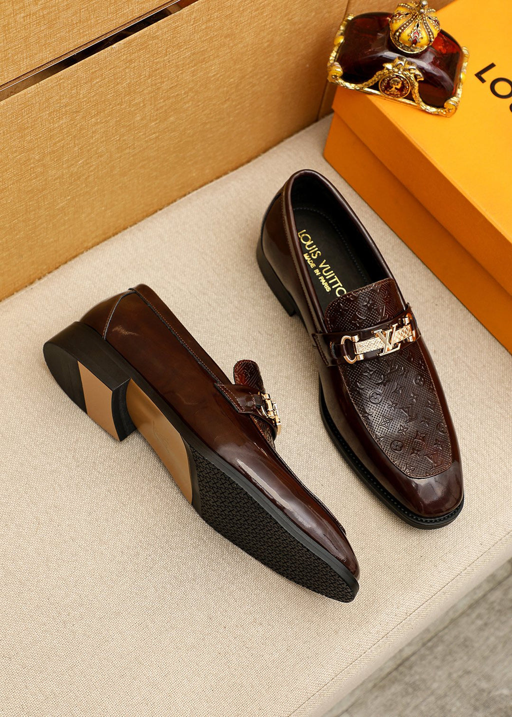 Louis Vuitton Embossed Buckle Loafers — front