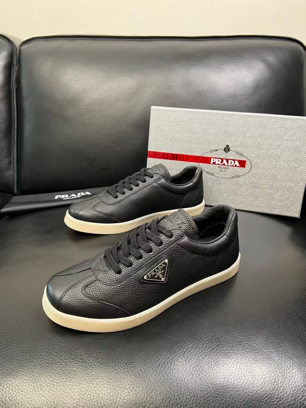 Prada Triangle Logo Low-Top Sneakers — front