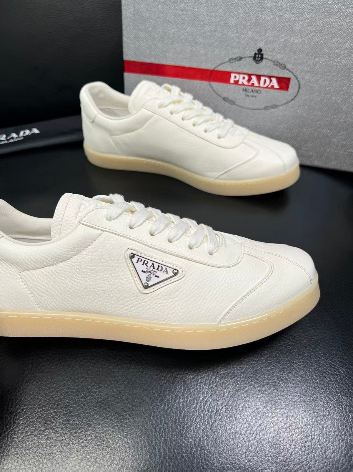 Prada Triangle Logo Low-Top Sneakers — detail