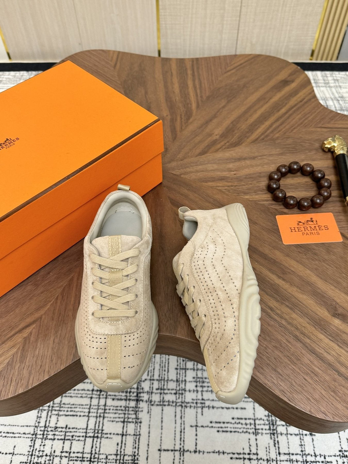 Hermès Perforated Low-Top Sneakers — front