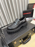 Prada Black Plaque Strap Loafers — front