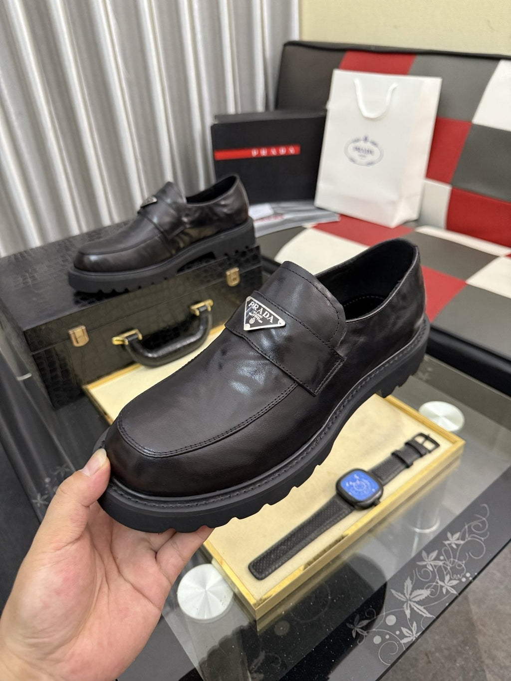 Prada Black Plaque Strap Loafers — model