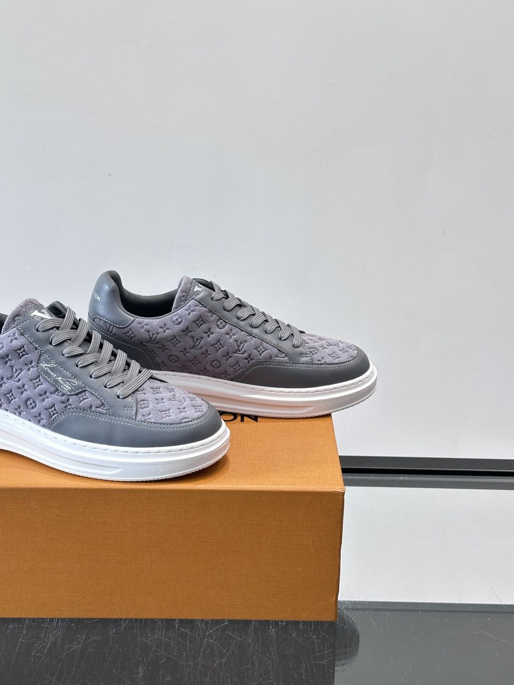 Louis Vuitton Embossed Low-Top Sneakers — back