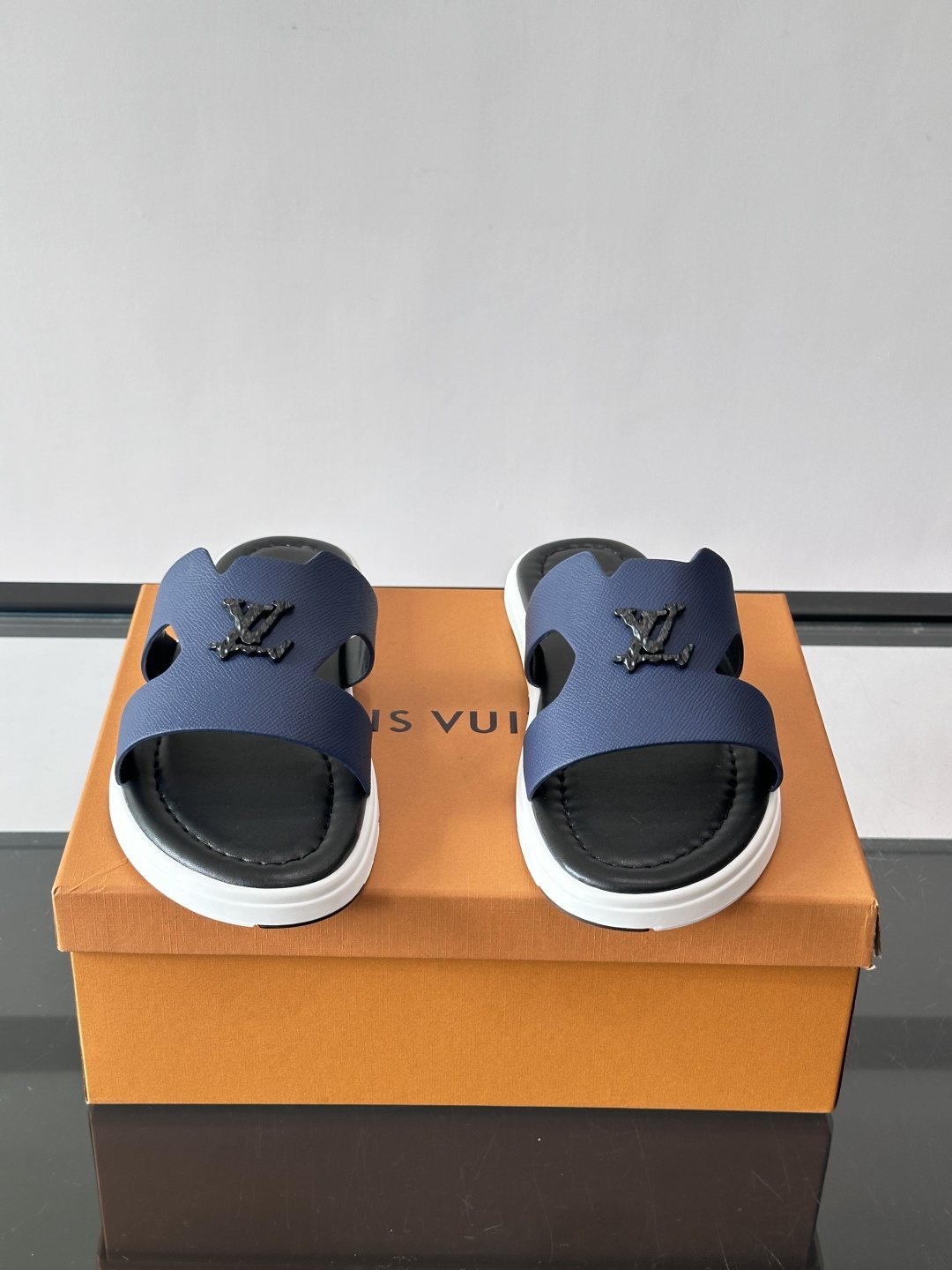 Louis Vuitton Isola Logo Slide Sandals — hero