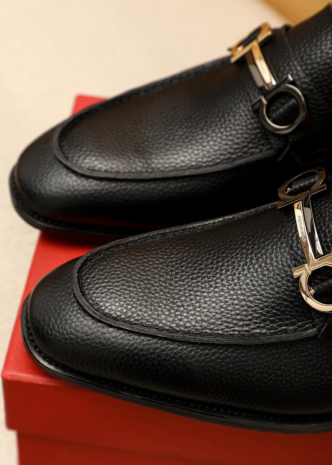 Ferragamo Pebble Leather Buckle Loafers — detail