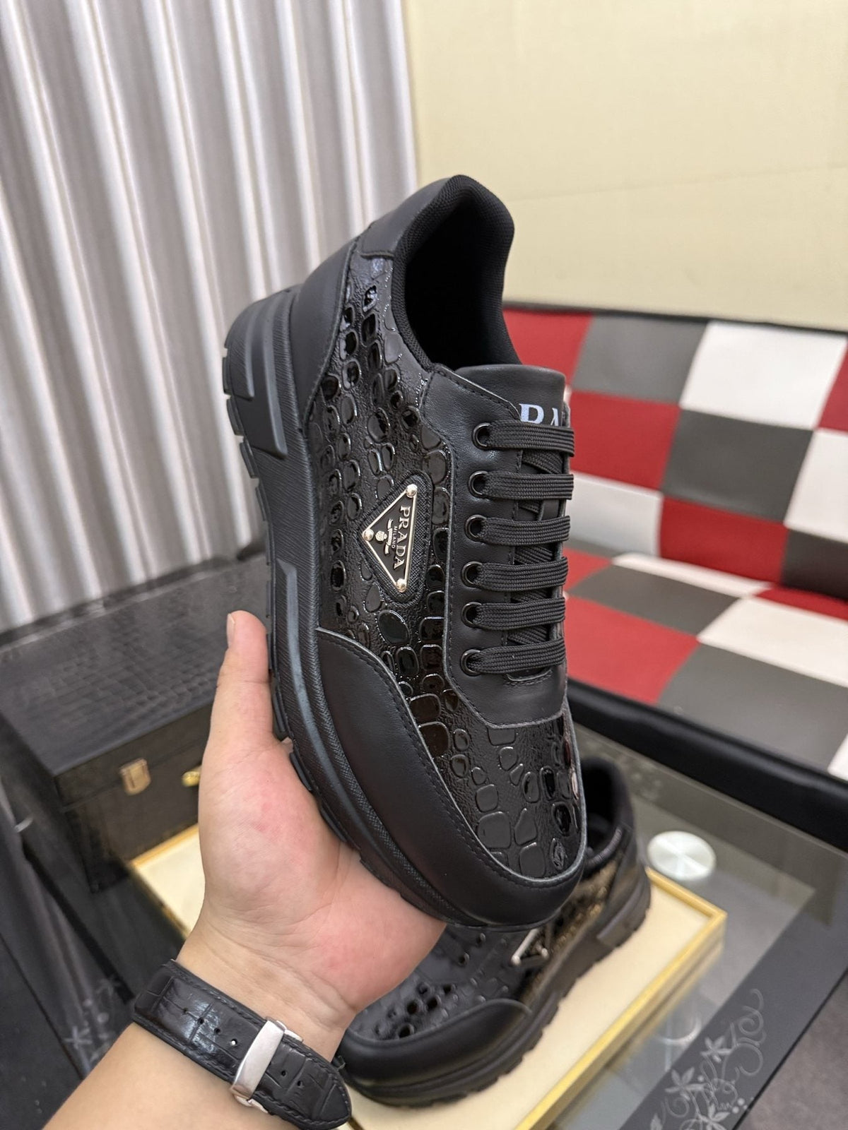 Prada Triangle Badge Low-Top Sneakers — model