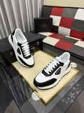 Prada Triangle Badge Low-Top Sneakers — hero