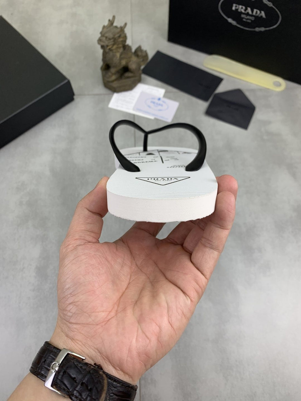 Prada Black Strap White Flip Flops — back