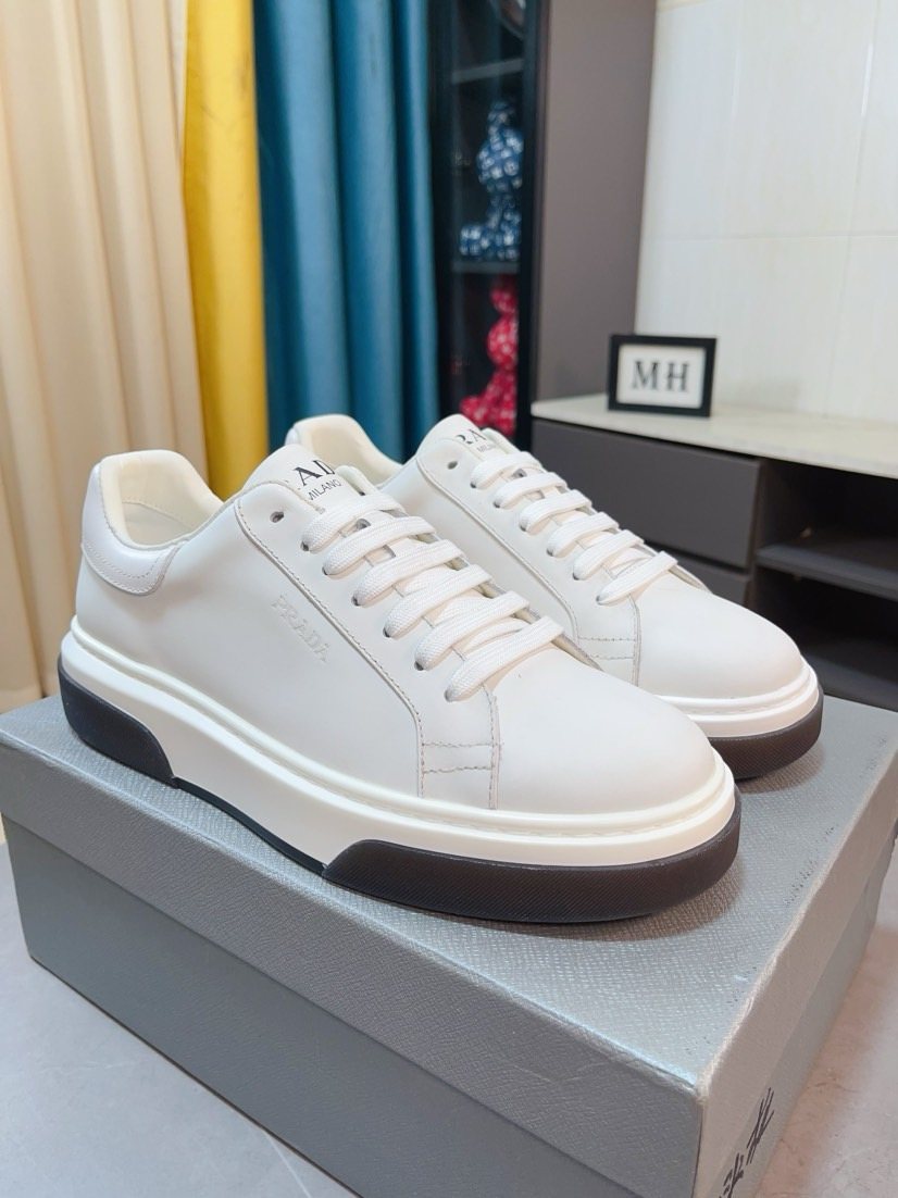 Prada Triangle Patch Low-Top Sneakers — front