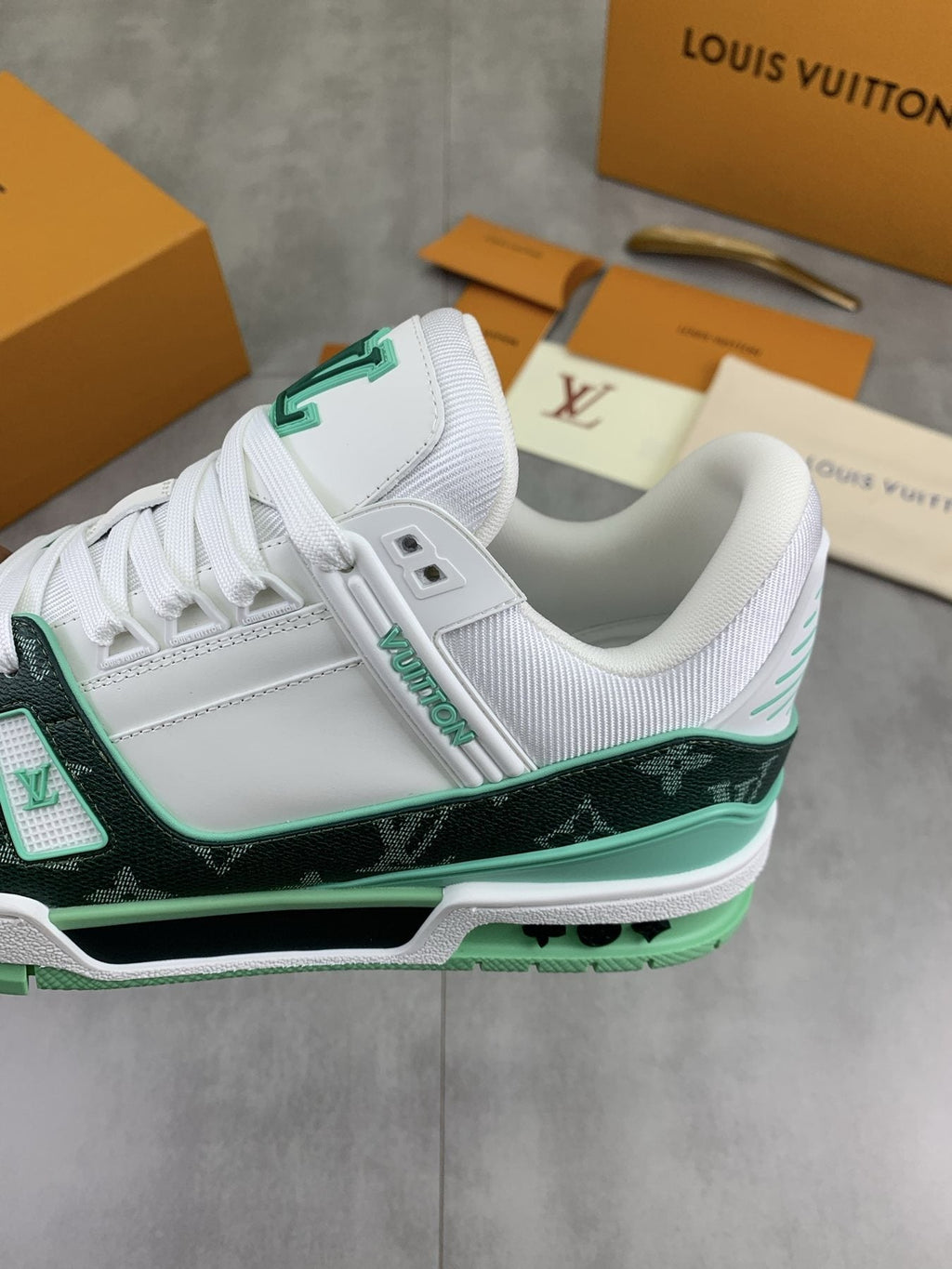 Louis Vuitton White and Navy Blue Sneakers — side