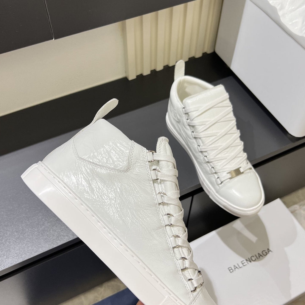 Balenciaga High-Top Lace-Up Sneakers — model