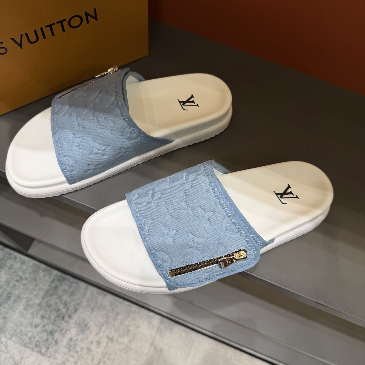 Louis Vuitton Embossed Zip Slide Sandals — front