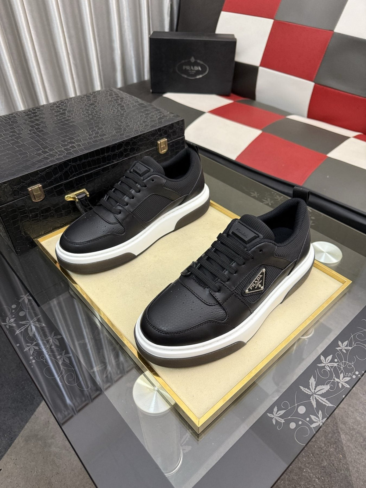 Prada Triangle Plaque Low-Top Sneakers — front
