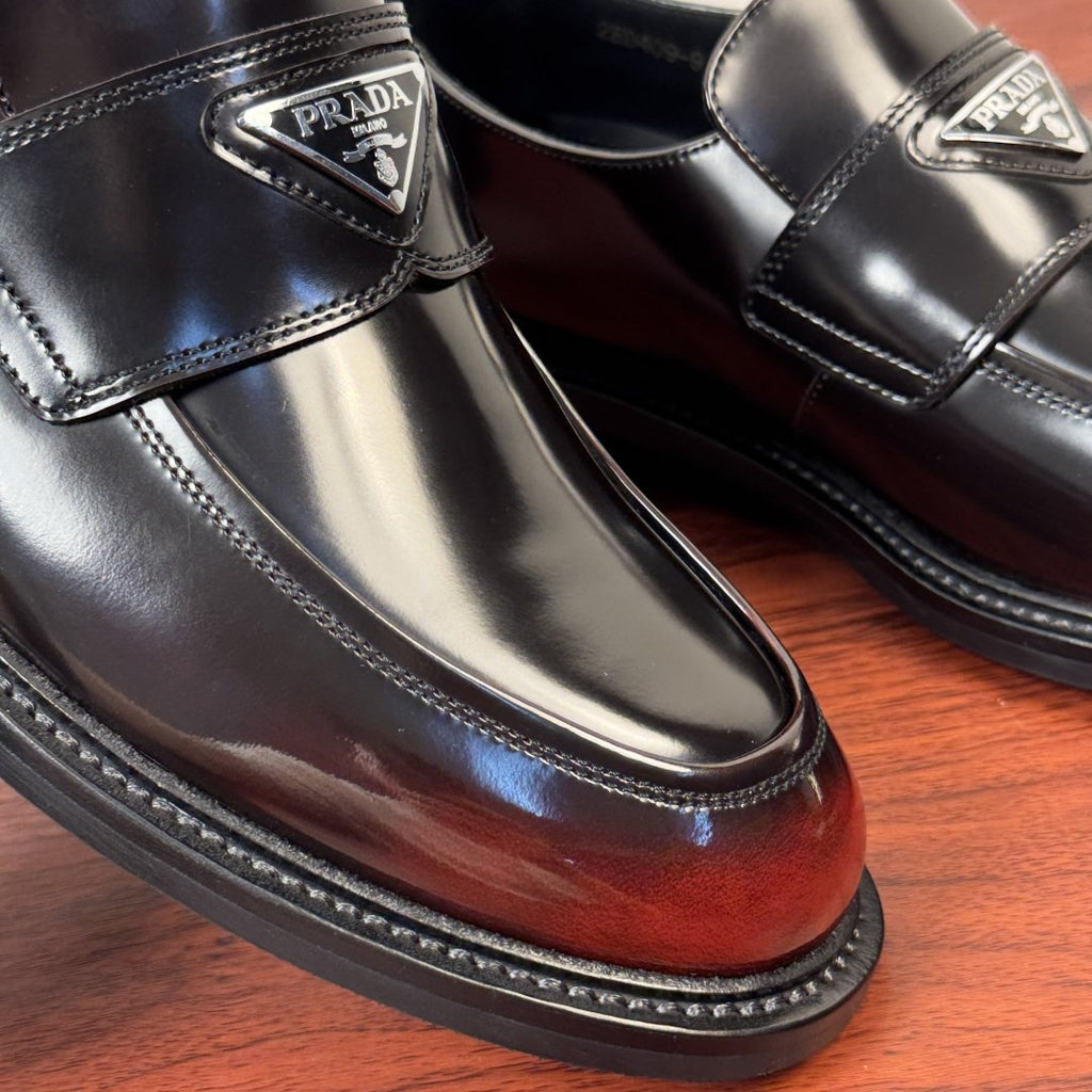 PRADA Red-Toe Leather Loafers — detail
