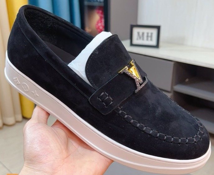 Louis Vuitton Moc-Toe Slip-On Loafers — model