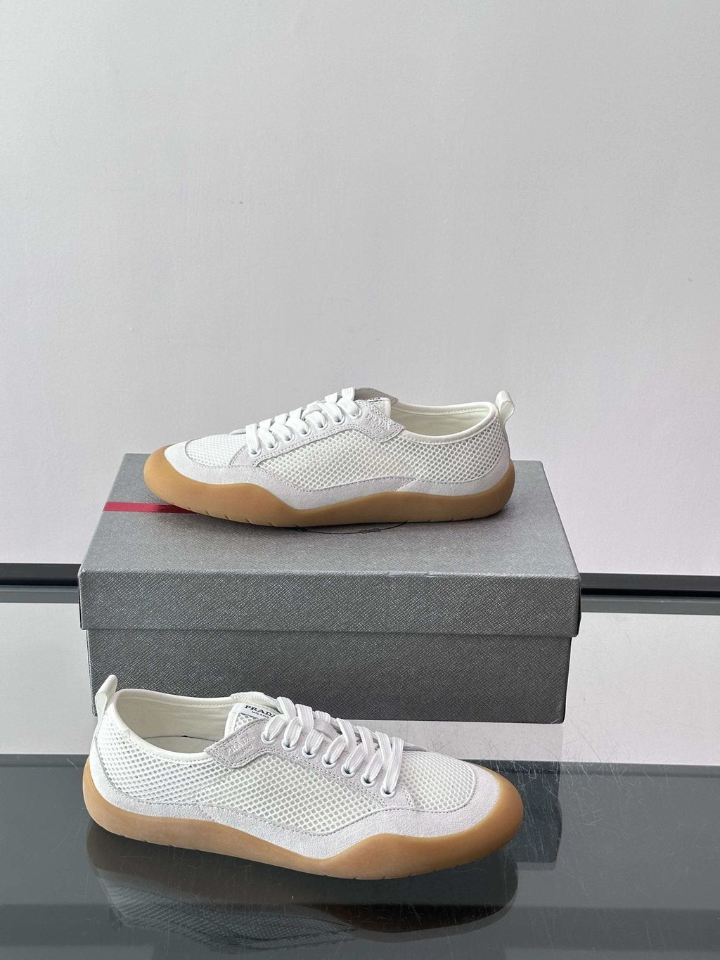 Prada Low-Top Perforated Sneakers — side